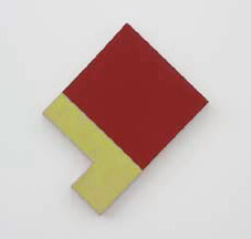 A small red square with a yellow piece sticking out.