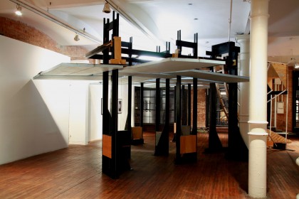 A large sculptural object by Michael Beutler in the middle of a gallery space.