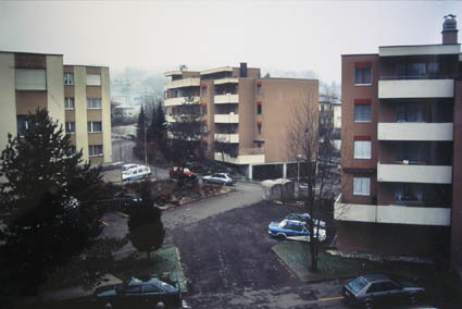 A image of a few buildings crowded near each other.